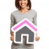 Woman with house sign Woman with house sign
