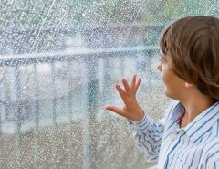 rainy day window boy