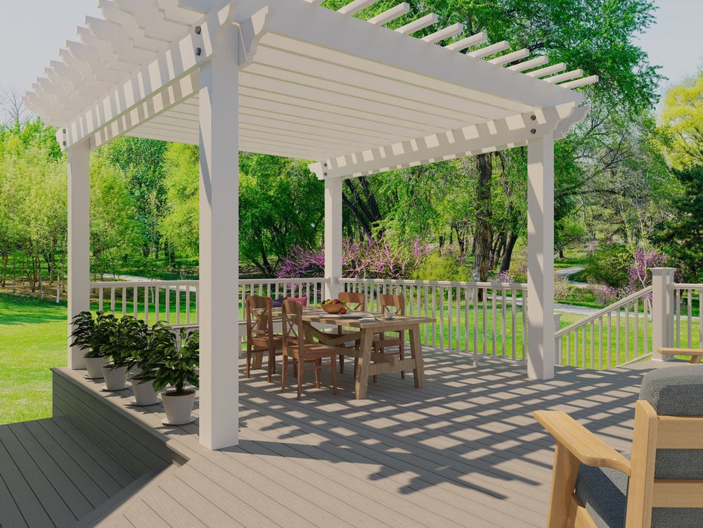 backyard deck with gray composite decking and white pergola